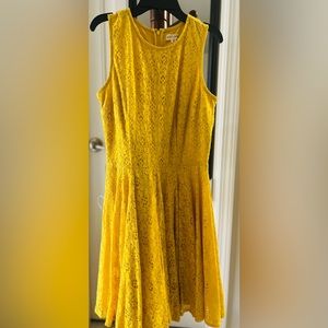 Yellow fit and flare dress.